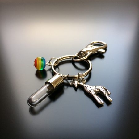rice writing rice charm key ring with giraffe charm with glass rainbow bead