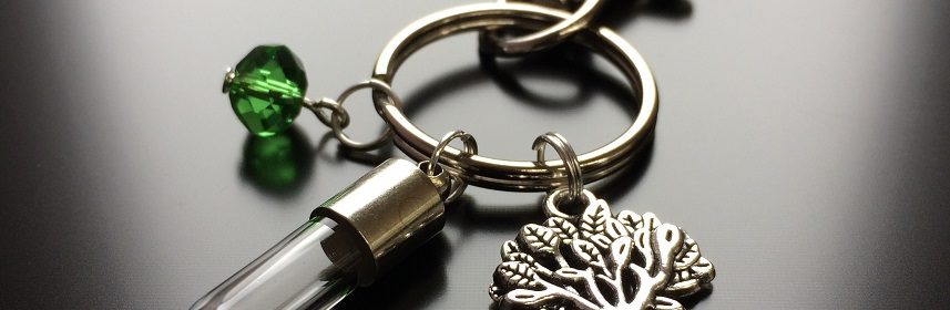 rice writing rice charm key ring with tree charm and green swarovski crystal